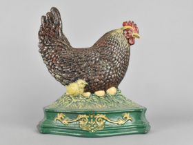 A Modern Cold Painted Cast Metal Door Stop in the Form of Hen with Eggs and Chick on Nest, 29cms