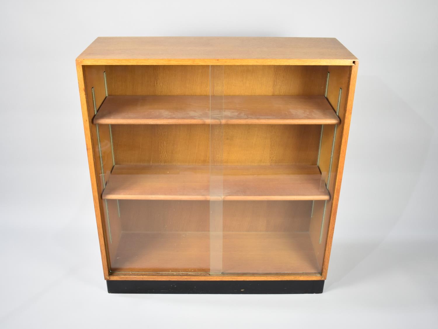A Vintage Glazed Light Oak Bookcase with Two Adjustable Shelves, 84cms Wide