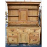 A Stripped Pine 19th Century Dresser Base with Two Banks of Graduated Drawers Either Side Single