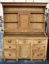 A Stripped Pine 19th Century Dresser Base with Two Banks of Graduated Drawers Either Side Single