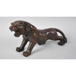 A Large Patinated Bronze Oriental Study of a Tiger, 34cms Long