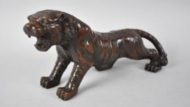 A Large Patinated Bronze Oriental Study of a Tiger, 34cms Long