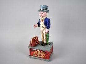 A Cold Painted Cast Metal Novelty American Money Bank in the Form of Uncle Sam, Working Order, 27cms