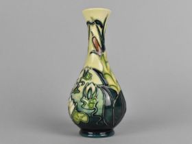 A Moorcroft Vase, Lily and Bullrush Pattern, 17cm high