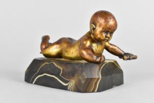 A French Gilt Bronze Paperweight or Garniture in the Form of an Infant with Rag, Banded Agate Plinth