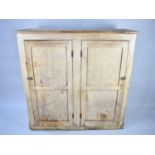 A Late 19th/Early 20th Century Pine Kitchen Larder Cupboard with panelled Doors to Shelved Interior,