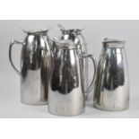 A Set of Four Elia Stainless Steel Lidded Jugs, the Tallest 21cm high