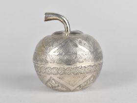 An Indian White Metal Novelty Tea Caddy in the Form of a Carved and Decorated Fruit, 8.5cms High