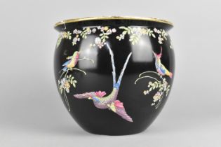 A Cetem Ware Jardiniere Decorated with Exotic Birds on Black Ground, 19.5cm high