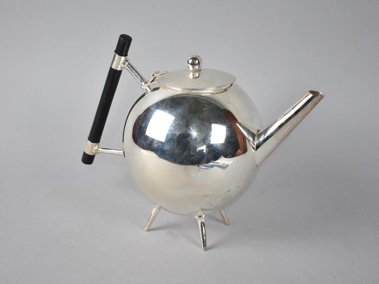 A Reproduction Silver Plated Dresser Style Globular Teapot with Ebonized Wooden handle, 18cms High