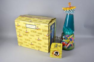 A Beatles Yellow Submarine Lava Lamp and a Boxed Set of Four Coalport Coasters for Beatles Yellow