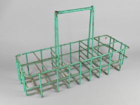 A Green Painted Wire Bottle Rack with Two Four Bottle Stores Flanking Central Larger Store, with