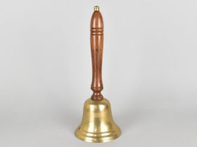 A Modern Brass Bell with Turned Wooden Handle, 30cms High