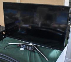 A Samsung 31" TV with Remote