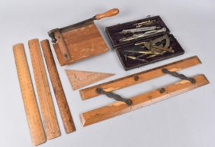 A Collection of Various Vintage Drawing Instruments, Rulers and a Guillotine