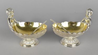 A Pair of Reproduction 19th Century Silver Plated Salts in the Form of Cherubs with Shells