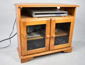 A Modern Pine Corner TV Stand Complete with Sony DVD Player and Video Player Etc
