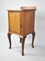 An Edwardian Mahogany Bedside Cabinet with Panelled Door to Shelved Interior, Cabriole Supports,