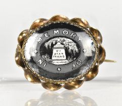 A 19th Century Oval Mourning Brooch, Glass Panel with Enamelled Internal Monochrome Decoration and