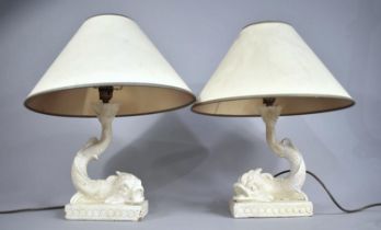 A Pair of Cream Painted Plaster Table Lamps in the Form of 19th Century Dolphins, With Shades,