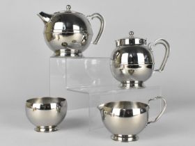 An Old Hall Stainless Steel Four Piece Globular Tea Service