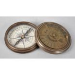A Reproduction Brass Cased Circular Compass, Screw Off Lid Having 100 Year Calendar for 1957-2056,