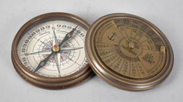 A Reproduction Brass Cased Circular Compass, Screw Off Lid Having 100 Year Calendar for 1957-2056,