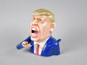 A Cold Painted Cast Metal American Novelty Money Bank in the Form of Donald Trump, Plus VAT