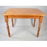 A Modern Pine Kitchen Table, 107cms by 74cms