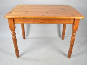 A Modern Pine Kitchen Table, 107cms by 74cms