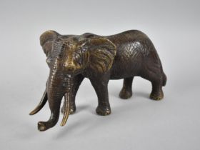 A Large Heavy Patinated Bronze Study of a Bull Elephant, 30cms Long