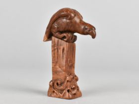 A Carved Japanese Wooden Seal Depicting Perched Sea Eagle on Rock, 8cms High