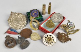 A Collection of Various Military Badges, Spent Bullet Cases, Silver ARP Badge Etc