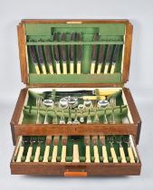 An Art Deco Oak Cased Canteen of Cutlery with Base Drawer, Incomplete, 49.5cms Wide