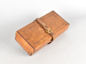 An Early 20th Century Leather Rectangular Box with Hinged Lid and Securing Strap, 22cms by 10cms