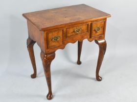 A Reproduction Burr Walnut Lowboy with Small Centre Drawer Flanked by Two Deeper Drawers, Cabriole