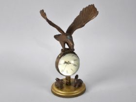 A Reproduction Desktop Bronze Effect Novelty Ball Clock with Eagle Having Outstretched Wings