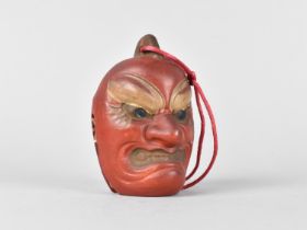 A Japanese Bell, Painted Mask in the Form of a Snarling Demon to Ward Off Evil Spirits, 11cm High