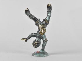 A Green Patinated Bronze Souvenir for Düsseldorf in the Form of a Young Boy Doing Cartwheel, 11cm