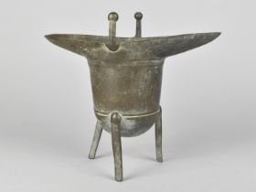 A Chinese Bronze Wine Vessel of Archaic Form, 17cm High