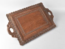 A Intricately Carved Wooden Wooden Two Handled Tray, 46cm Long