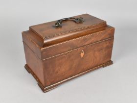 A Mid 19th Century Sarcophagus Shaped Inlaid Mahogany Tea Caddy, the Hinged Lid to Three Section