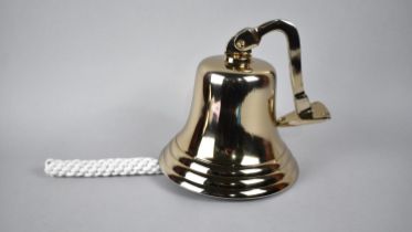 A Reproduction Wall Mounting Bell, 19cms High, Plus VAT