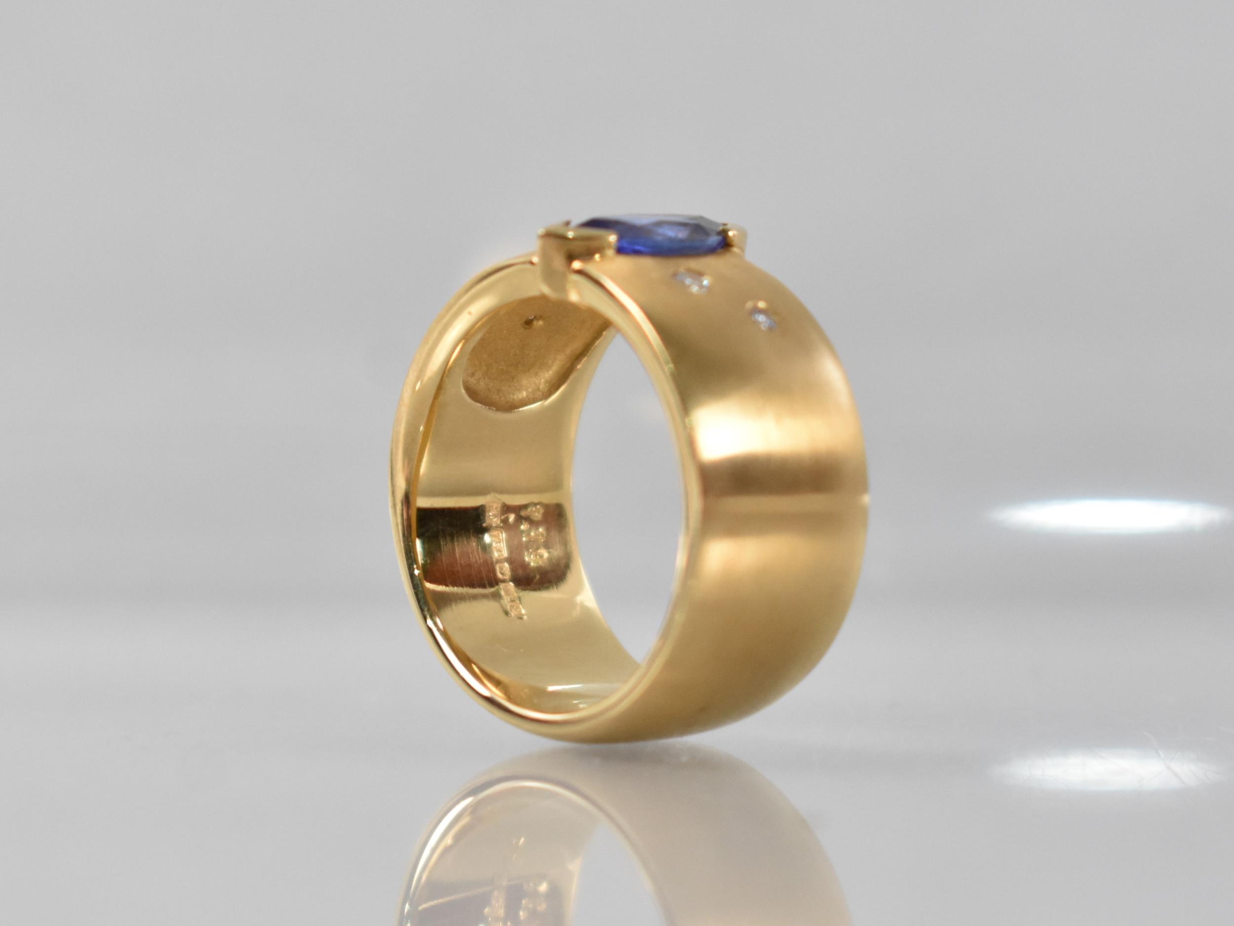 A Contemporary 18ct Gold, Diamond and Tanzanite Ring, Central Marquise Cut Stone Measuring 5.02 by - Image 3 of 9