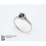 Beaverbrooks 18ct White Gold Sapphire and Diamond Halo Ring