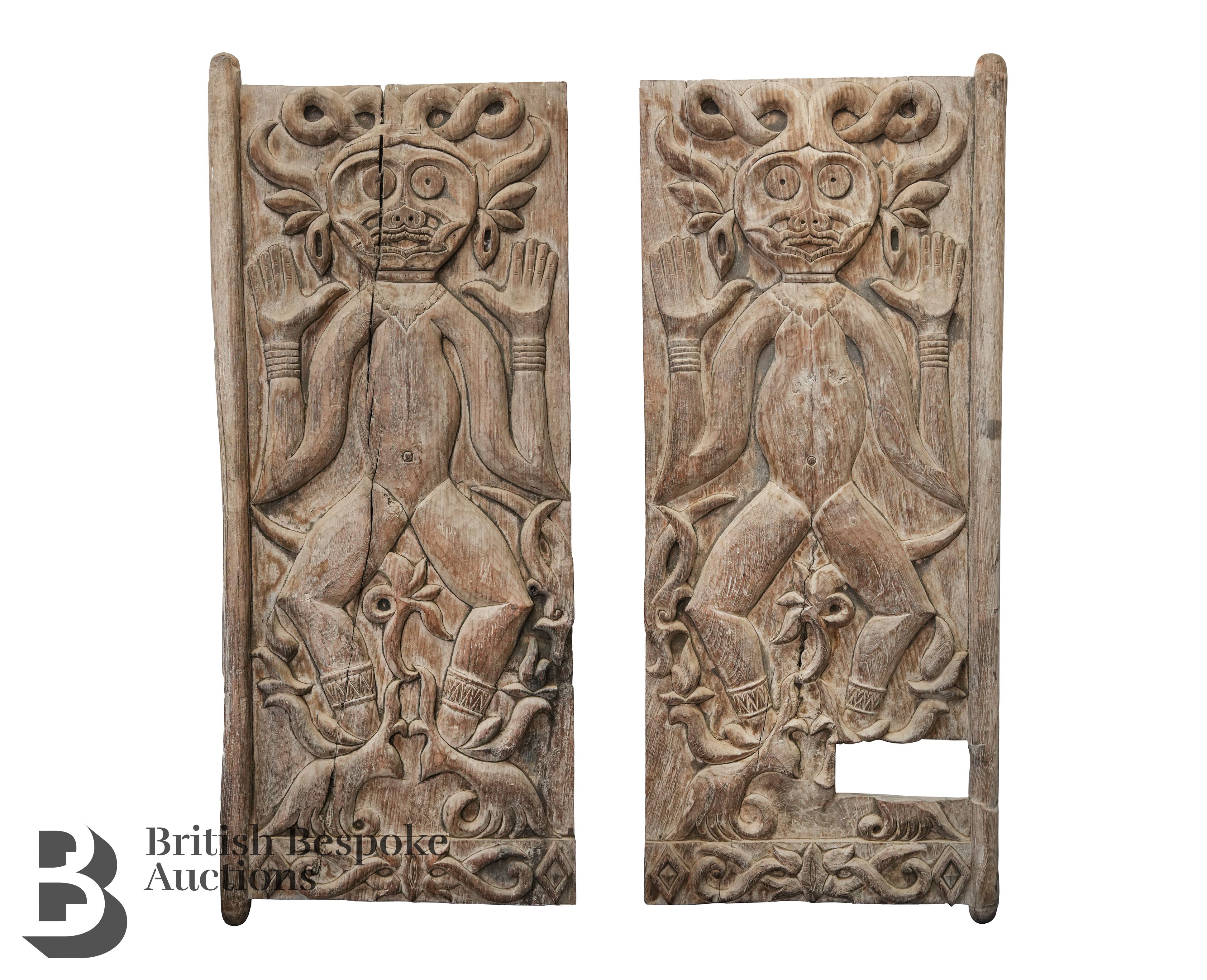 Pair of Carved Anthropomorphic Tribal Shutters