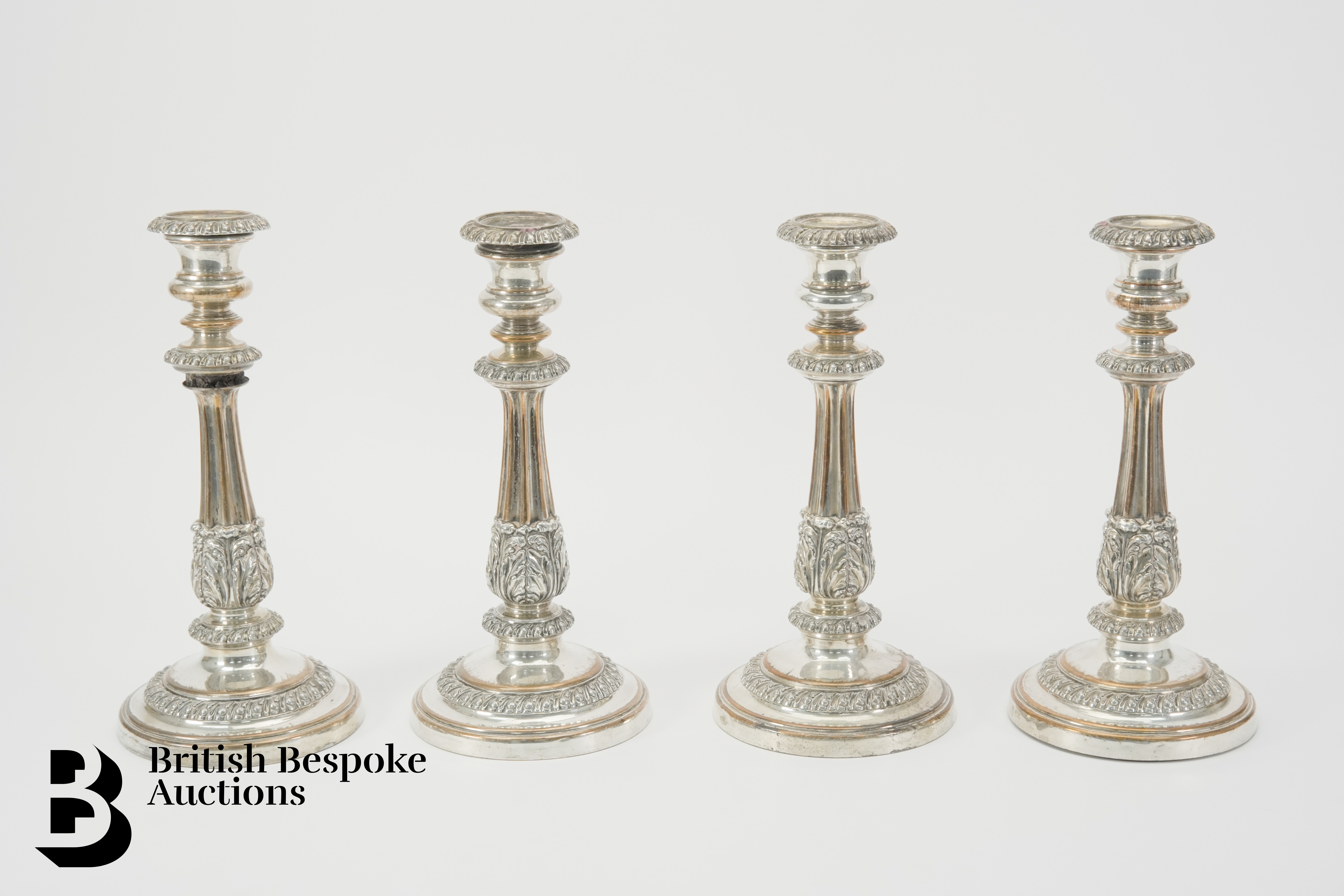 Four Silver Plated Candlesticks