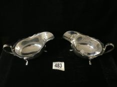 PAIR OF HALLMARKED SILVER SAUCEBOATS RAISED ON PAD FEET DATED 1965 BY BARKER ELLIS & CO 17CM 335
