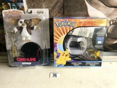 BOXED POKEMON BRACELET Z AND A BOXED GREMLINS GIZMO