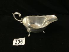 HALLMARKED SILVER SAUCEBOAT WITH SCROLL HANDLE ON HOOF FEET BY WILLIAM HUTTON & SONS 15.5CM 94